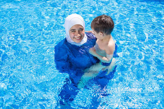 Muslim girl with special swimming suit