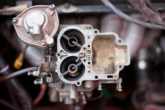 Dirty rusty carburetor of old russian car