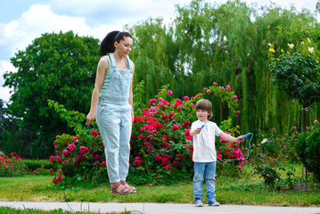 Sport activity lifestyle concept. Cute woman and son with - 89208059