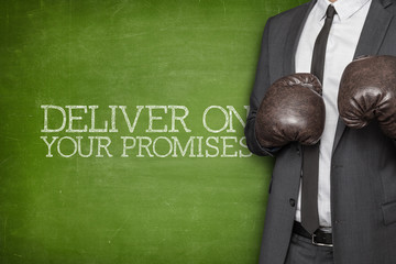 Deliver on your promises on blackboard with businessman 