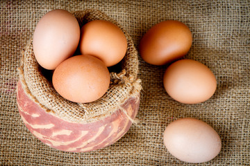 Raw egg put on old sack