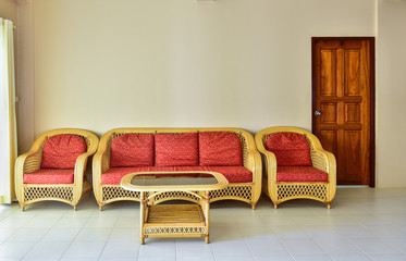 Yellow rattan armchair