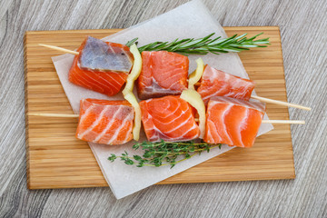 Raw salmon skewers