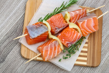 Raw salmon skewers