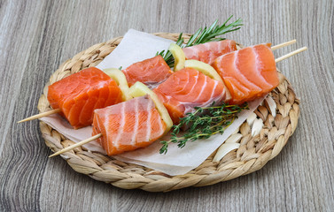 Raw salmon skewers