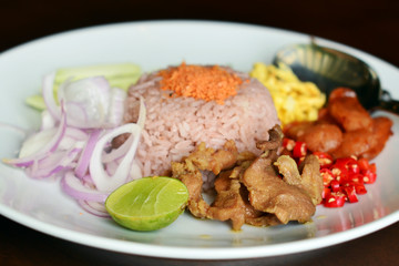 Mixed Cooked Rice with Shrimp Paste Sauce - Famous Thai traditional food (Selective focus)