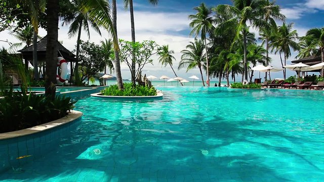 Tropical resort with swimming pool and ocean view
