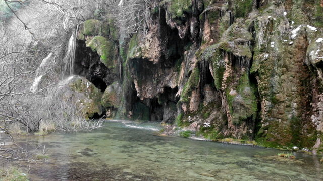 Natural   waterfall at river  in winter. Cuenca, Spain
