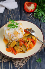 Rice and stew with chicken and vegetables