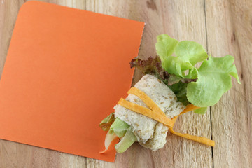roll salad and note paper.