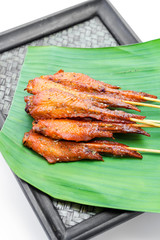 Fresh made chicken wing satay skewer