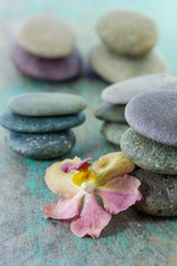 Fototapeta na wymiar spa concept with zen stones and orchid