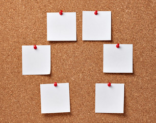 note paper on a cork board