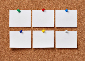 note paper on a cork board