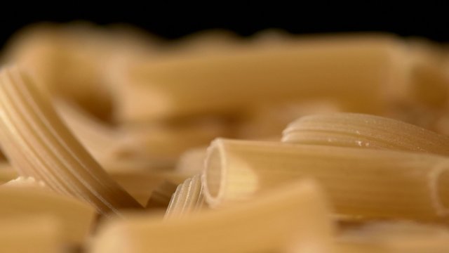 Type of Italian pasta, background, black, rotation, close up