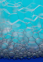 Fototapeta premium Soap bubbles macro forming hexagonal pattern