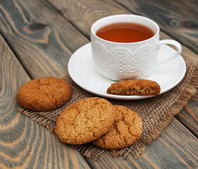 Cup of tea with oatmeal cookies