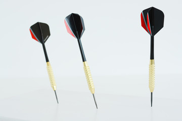 Dart arrows on white background suggesting business vision and strategy concept