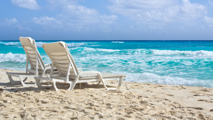 chairs on tropical beach