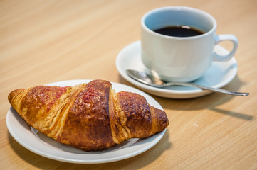 Coffee and croissant