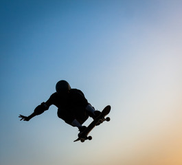 Fototapeta na wymiar Skateboarder Jumping