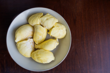 Durian peeled dish on wooden table