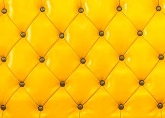 Yellow sofa leather background