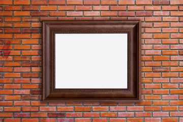 wood frames photo on red brick wall