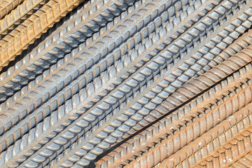 Rusty rebar steel used in construction background texture