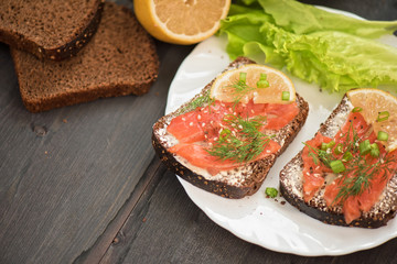 Sandwich with salmon for breakfast