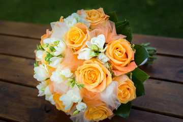 Bridal bouquet with orange and white flowers
