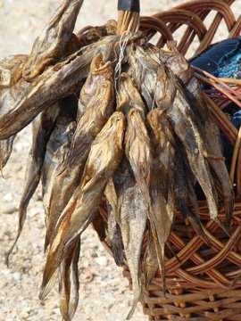 trade of fish/trading dried fish on the beach.dried fish