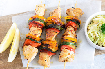 Healthy chicken kebabs and coleslaw