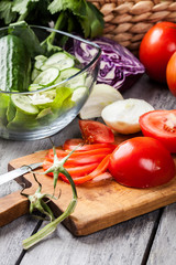 Chopped vegetables: tomatoes on cutting board