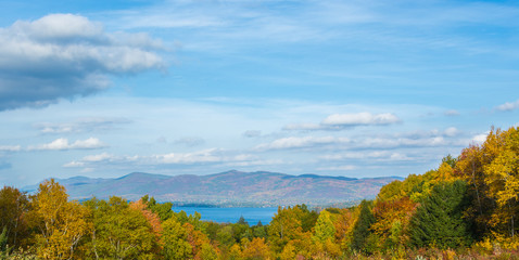 Lake George nestled in Autumn scenery.