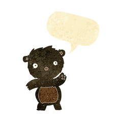 cartoon waving black bear cub with speech bubble