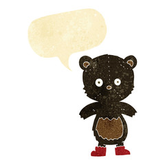 cartoon black bear cub with speech bubble