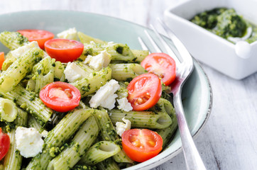 Pasta with pesto and fresh ingredients