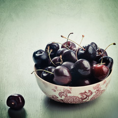 Bowl of cherries in vintage style