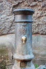 Old aged typical roman fountain