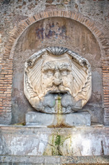 Fototapeta na wymiar Fountain mask, Aventino, Rome, Italy