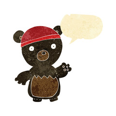 cartoon black bear wearing hat with speech bubble