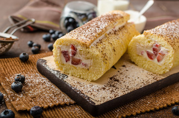 Sponge roll stuffed with strawberry cream