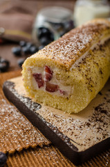 Sponge roll stuffed with strawberry cream