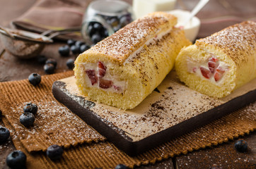 Sponge roll stuffed with strawberry cream