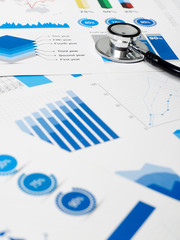 Stethoscope on chart papers