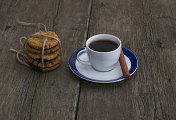cup of coffee and linking of oatmeal cookies