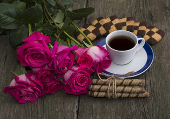 beautiful festive still life from flowers, cookies and coffee
