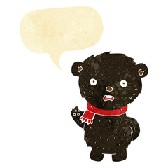 cartoon black bear wearing scarf with speech bubble