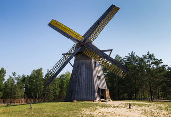 Fototapeta na wymiar The wooden windmill